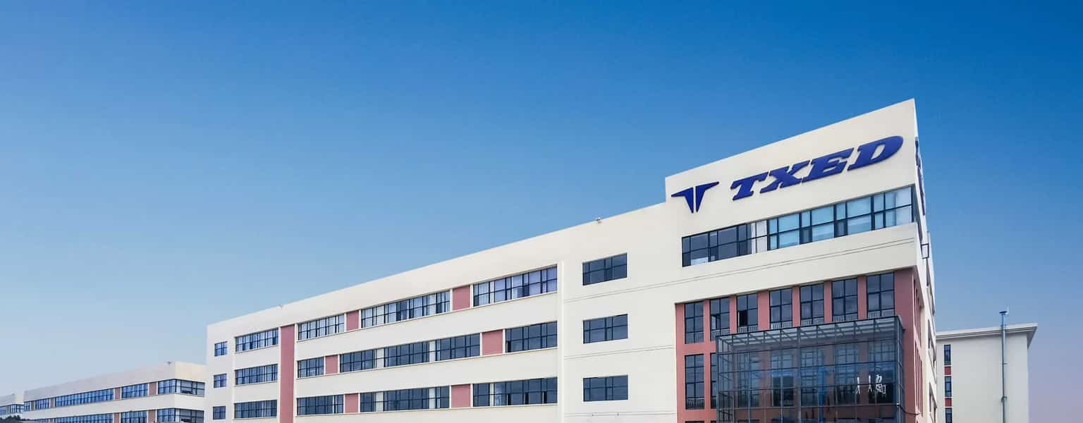 The modern exterior of the TXED corporate building