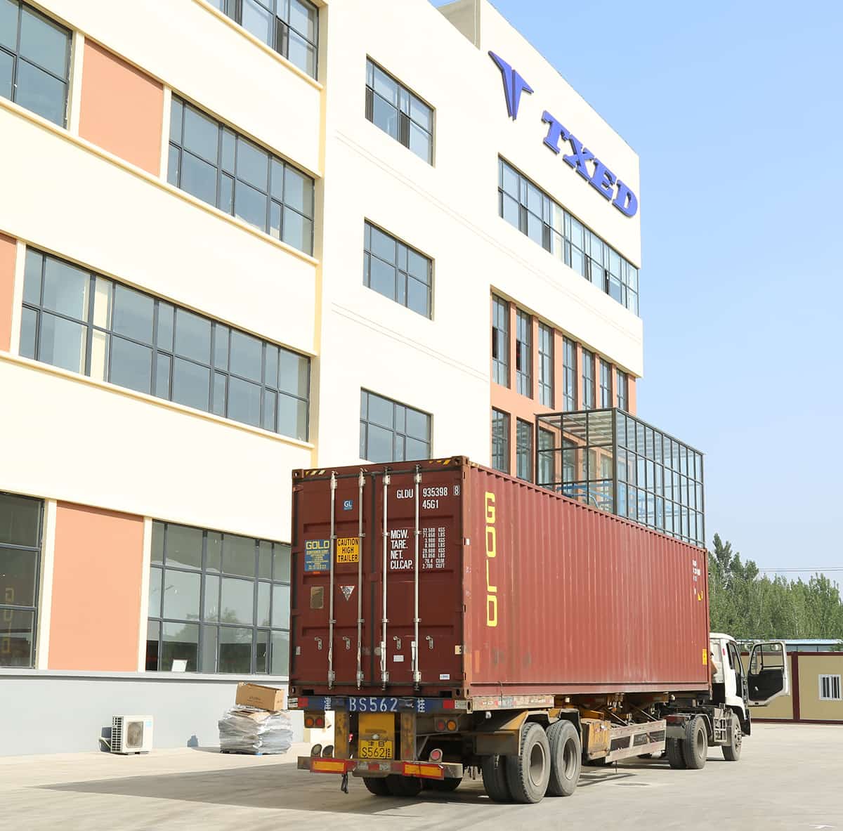 Inside the TXED factory, showing the bike assembly line.