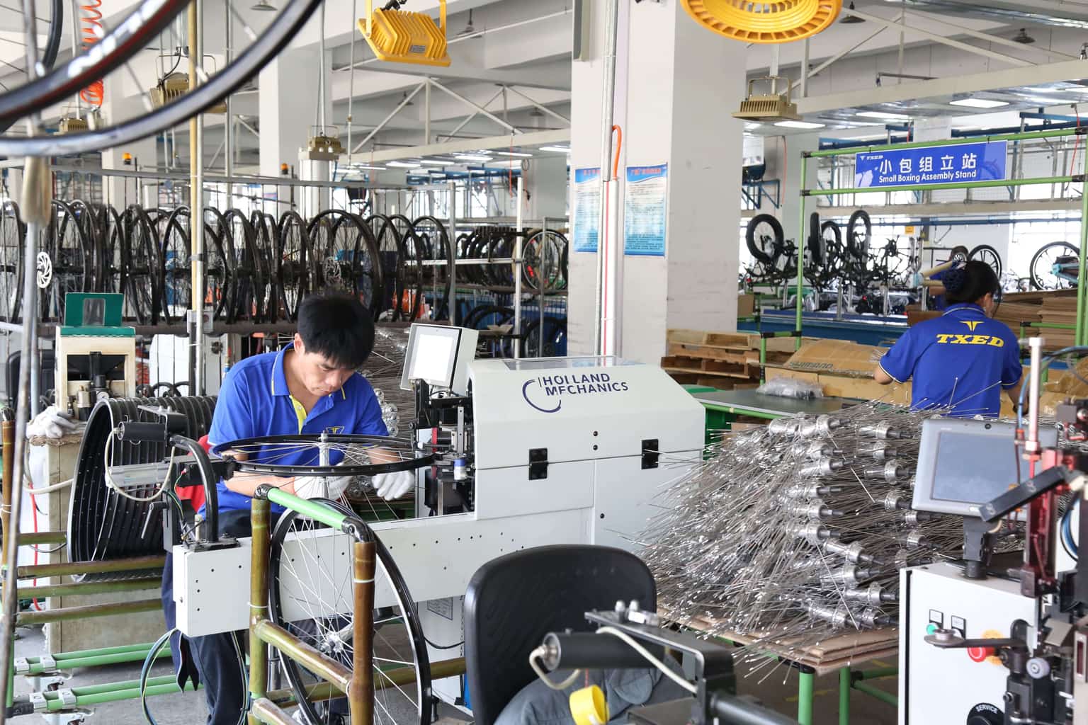 Main factory assembly line with workers