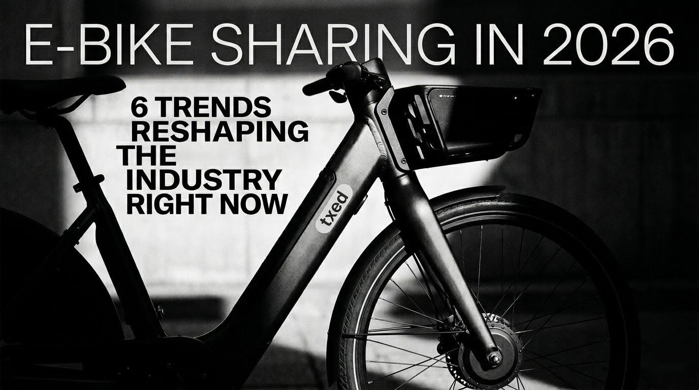 Row of shared e-bikes docked at a smart charging station in a modern city