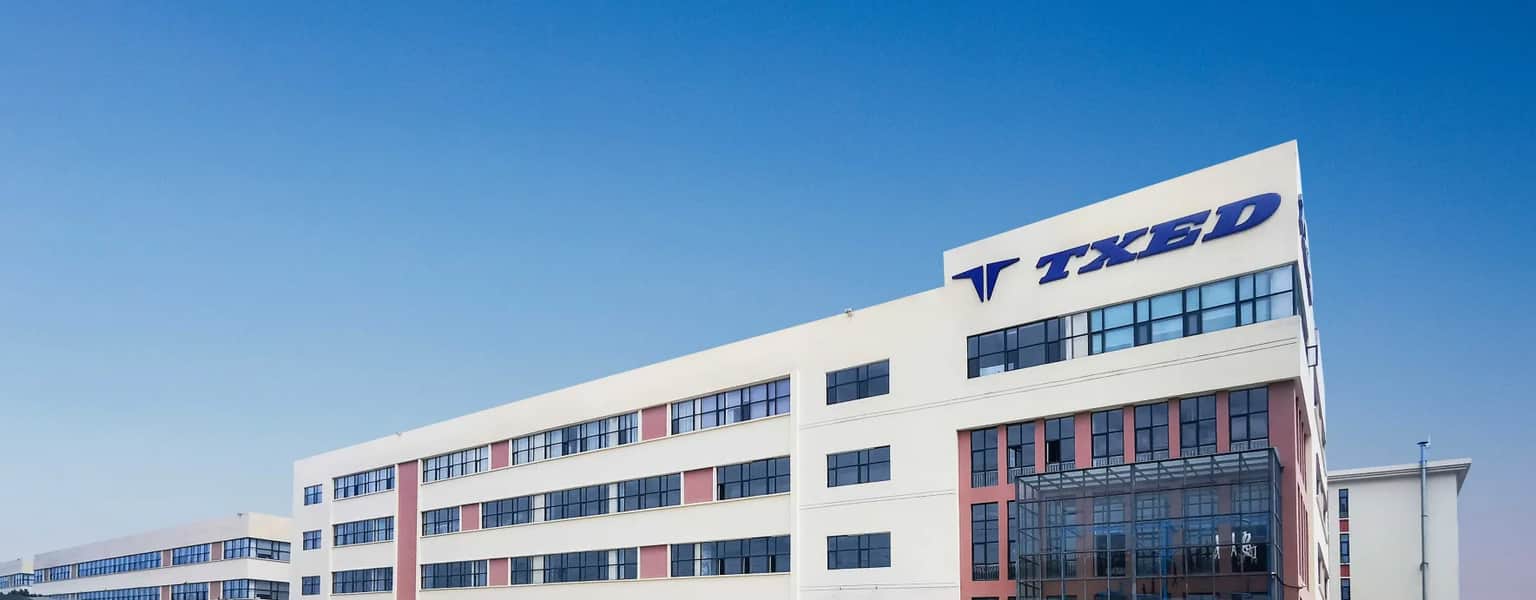 The modern exterior of the TXED corporate building